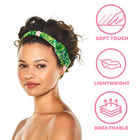 Woman wearing the tropical leaf print headband, with icons labeled “Soft touch,” “Lightweight,” and “Breathable”