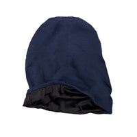 Navy jersey beanie turned partly inside out to show its black satin lining