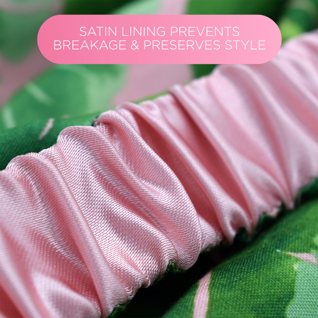 Close-up of the headband’s pink satin lining and gathered back, with the text “Satin lining prevents breakage & preserves style”