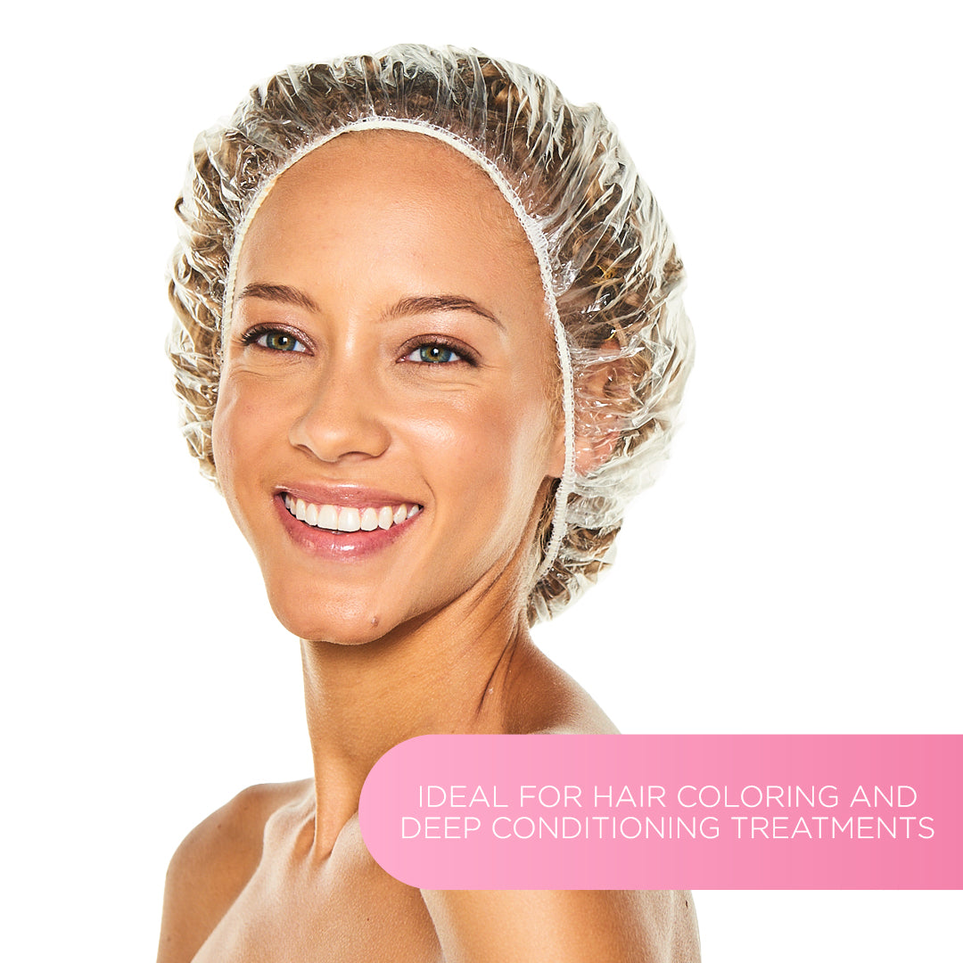 Smiling woman wearing a clear processing cap over her curly hair, with the text “Ideal for hair coloring and deep conditioning treatments”